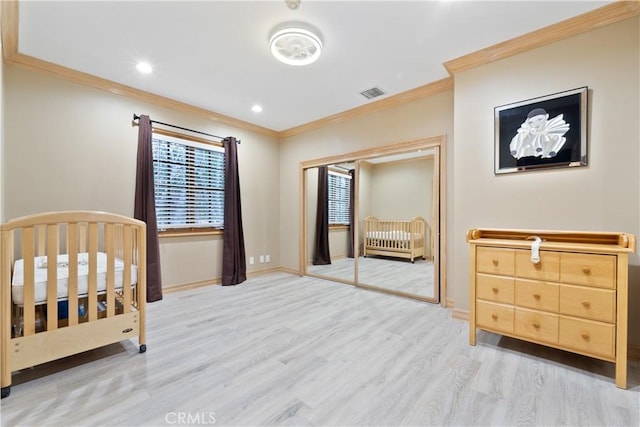 6011 Paseo La Vis, Woodland Hills, CA 91367 - bedroom with crown molding, baseboards, light wood-style flooring, and visible vents