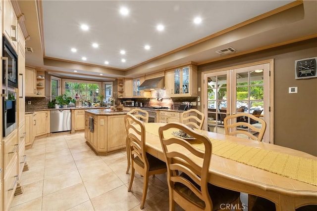 6011 Paseo La Vis, Woodland Hills, CA 91367 - dining space with light tile patterned flooring, a raised ceiling, recessed lighting, visible vents, and ornamental molding