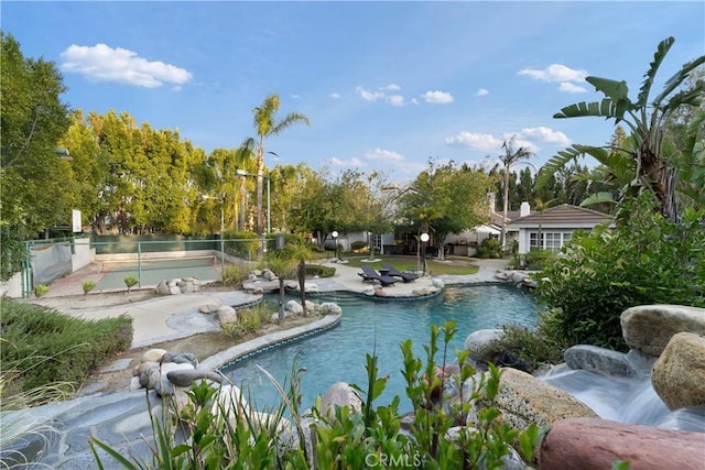 6011 Paseo La Vis, Woodland Hills, CA 91367 - outdoor pool with fence and a patio area