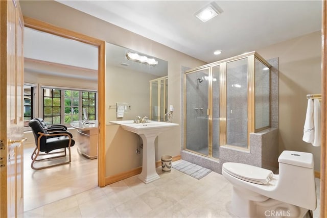 bathroom featuring walk in shower and toilet