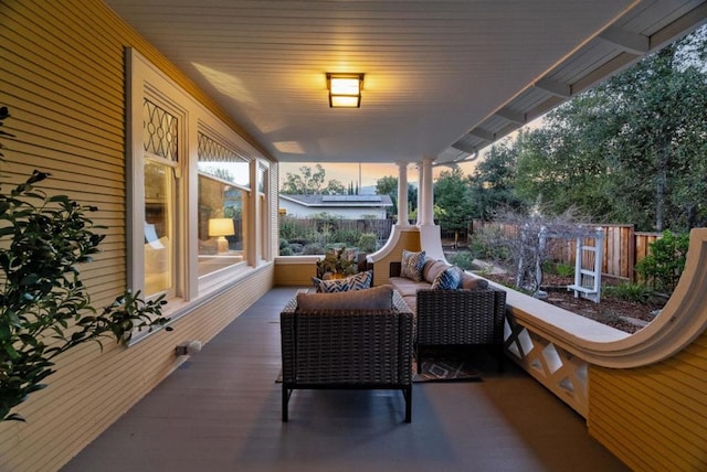 patio terrace at dusk with an outdoor hangout area