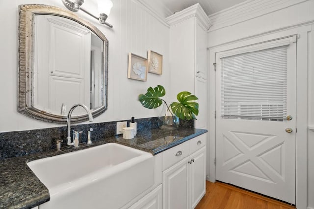 bathroom featuring vanity and hardwood / wood-style floors