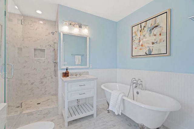 bathroom featuring vanity and separate shower and tub