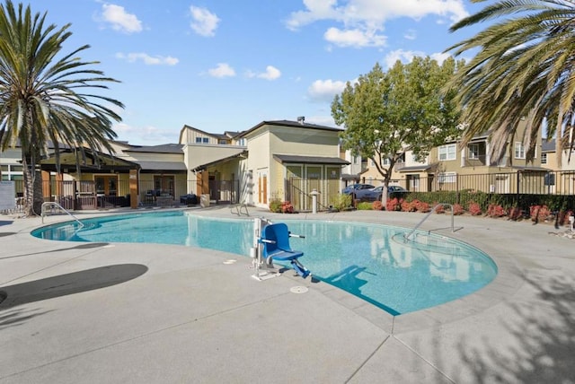 view of pool featuring a patio area