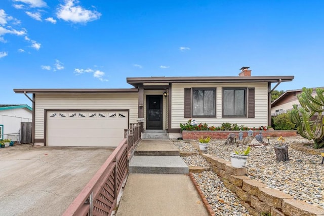 single story home featuring a garage