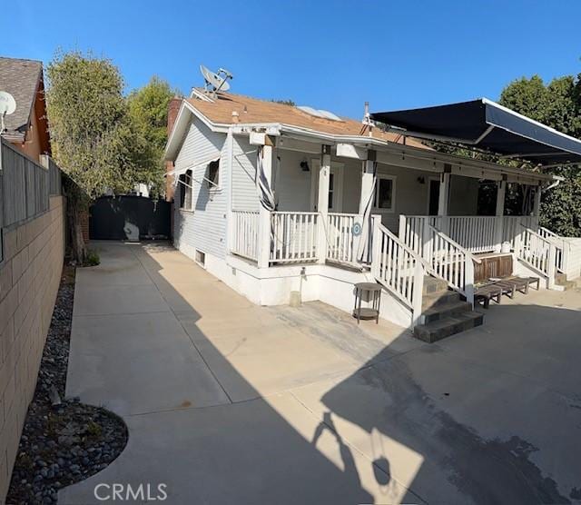 view of front of house featuring a patio