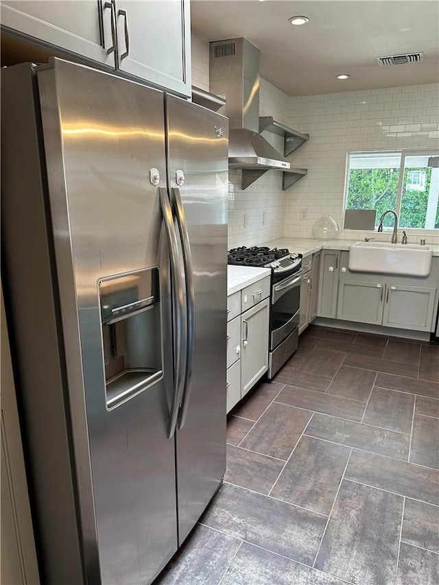 1886 Wagner St, Pasadena, CA 91107 - kitchen featuring stainless steel appliances, a sink, wall chimney exhaust hood, open shelves, and decorative backsplash