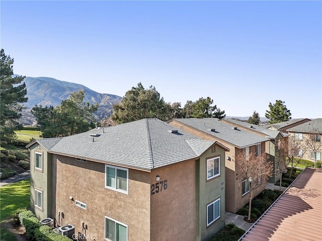 exterior space featuring a mountain view