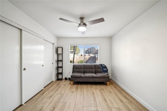 unfurnished room featuring ceiling fan and light wood-type flooring