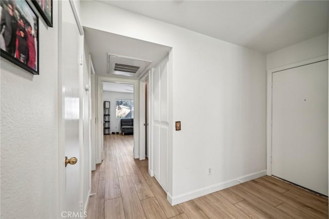 hallway featuring light hardwood / wood-style floors