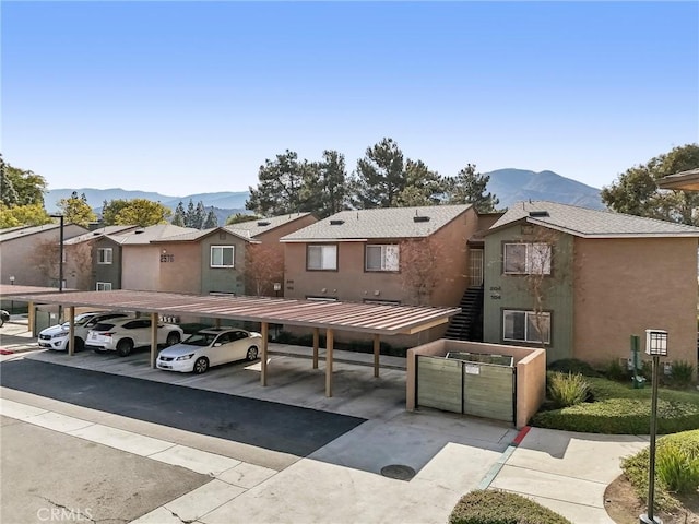 view of front of home with a mountain view