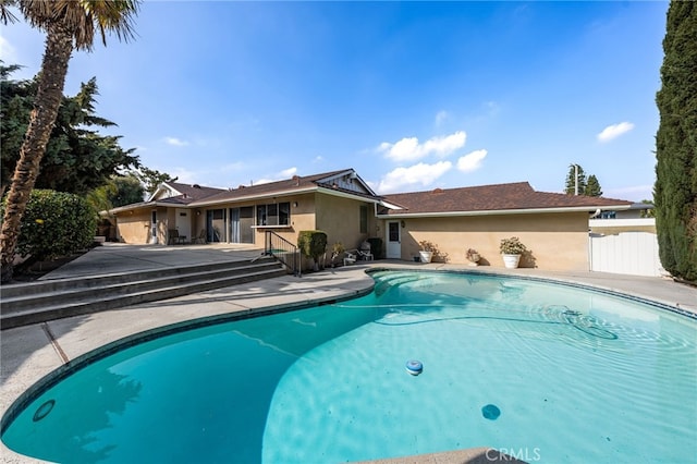 view of pool featuring a patio