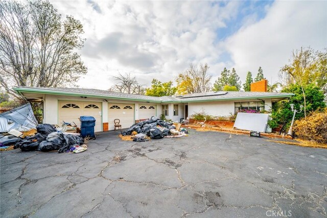 ranch-style house with a garage