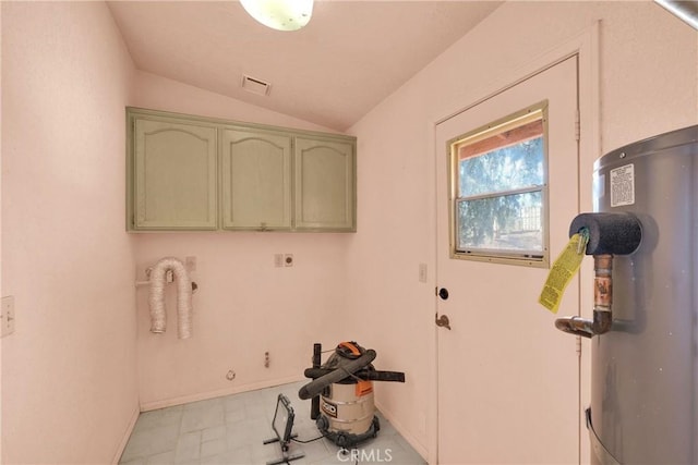 washroom with electric dryer hookup, cabinets, and water heater