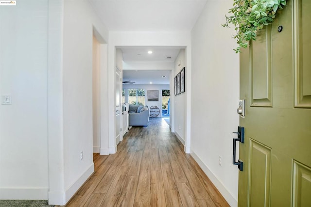 hallway featuring light hardwood / wood-style flooring