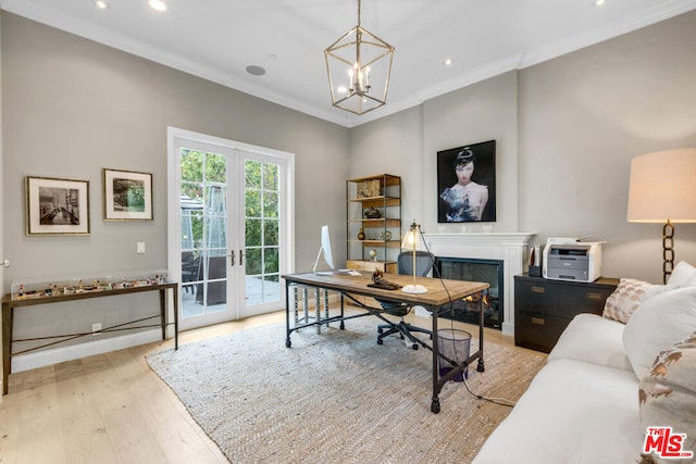 office with crown molding, a chandelier, light hardwood / wood-style floors, and french doors