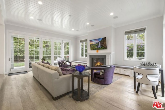 living room featuring ornamental molding, wood ceiling, and light hardwood / wood-style flooring