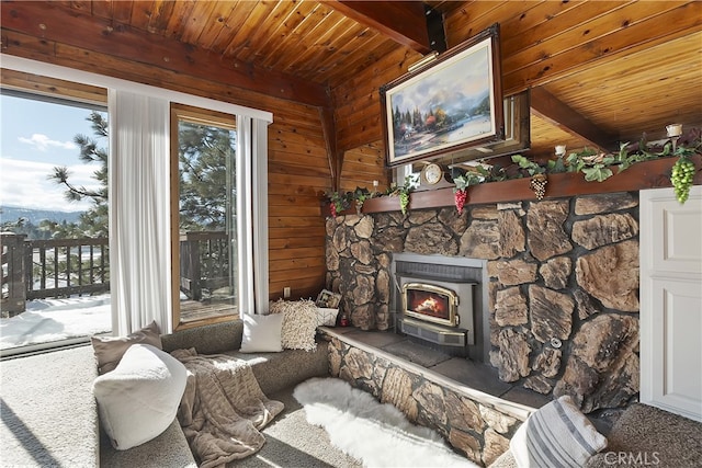 living room featuring a wealth of natural light, wooden ceiling, and beam ceiling