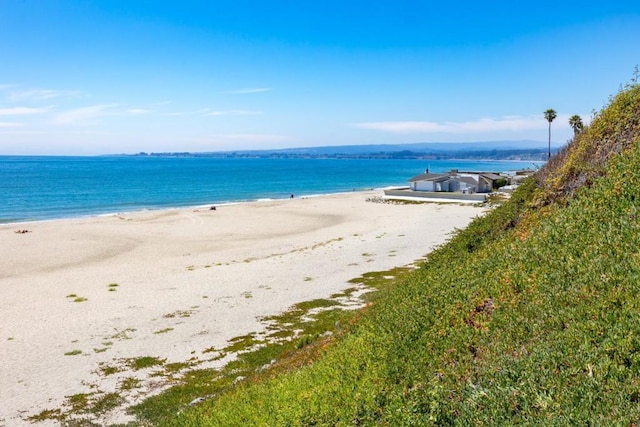 view of water feature with a beach view