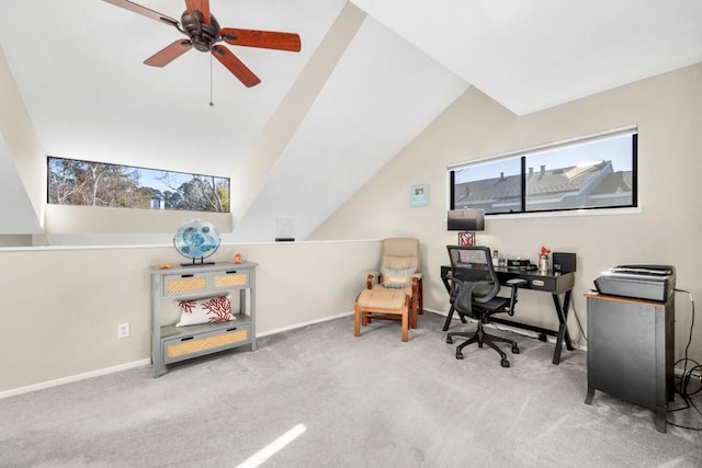 carpeted office featuring lofted ceiling and ceiling fan