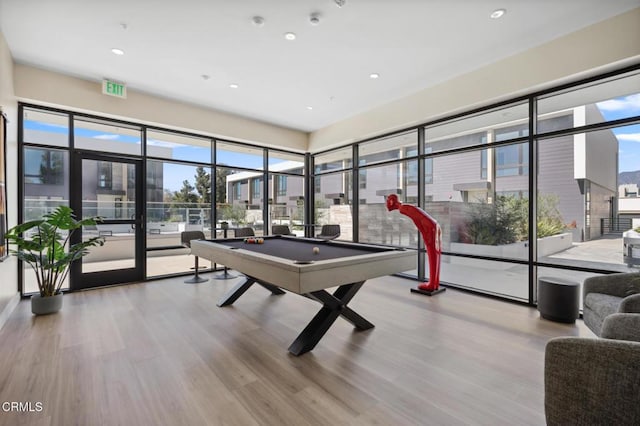 rec room featuring billiards and light hardwood / wood-style flooring