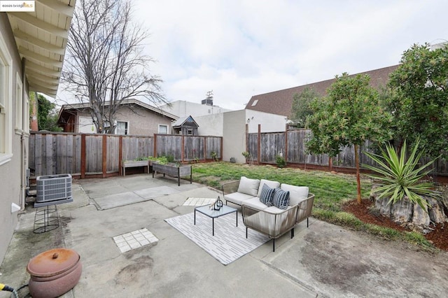 view of patio with outdoor lounge area and central AC