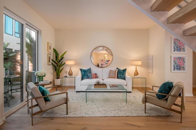 sitting room with hardwood / wood-style floors