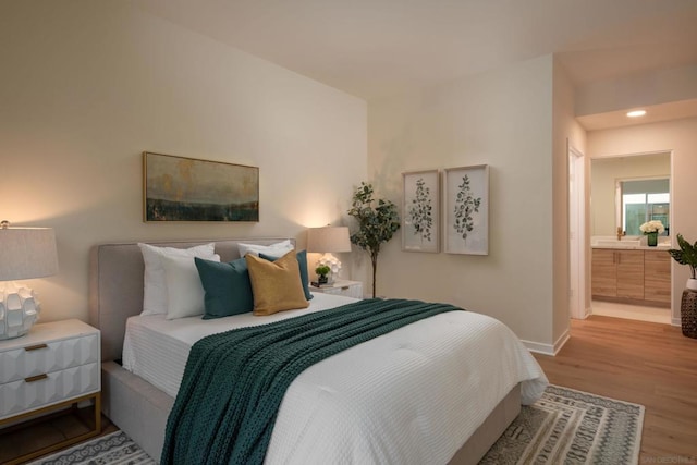 bedroom featuring wood-type flooring