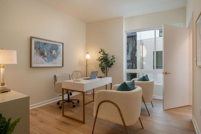 home office featuring light wood-type flooring