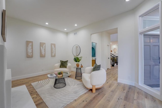 sitting room with light wood-type flooring