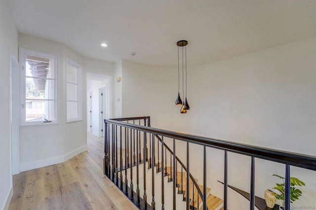 hall with light wood-type flooring