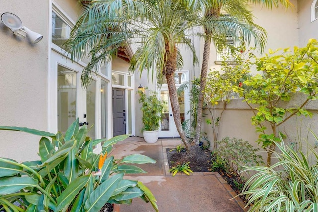 doorway to property with a patio area