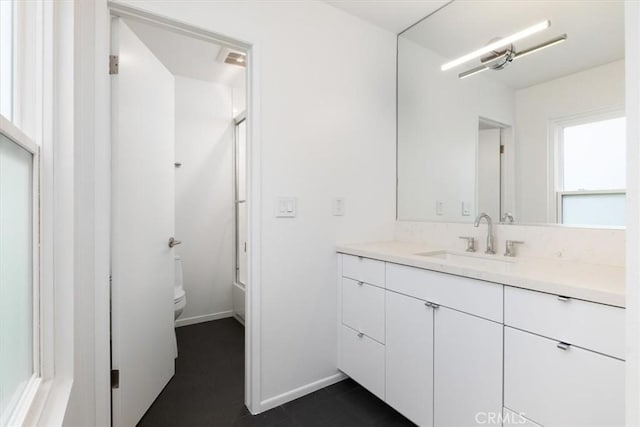 full bathroom featuring vanity, tile patterned flooring, shower / tub combination, and toilet