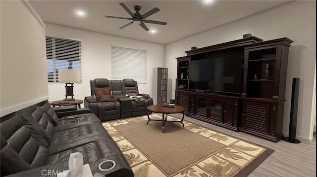 living room with light hardwood / wood-style floors and ceiling fan