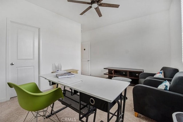 office area with light carpet and ceiling fan