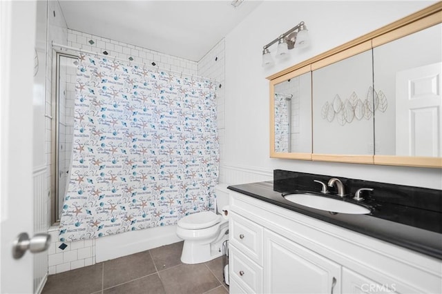 full bathroom with shower / tub combo, vanity, toilet, and tile patterned flooring