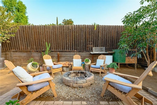 view of patio / terrace featuring a fire pit