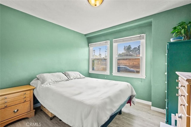 bedroom featuring light hardwood / wood-style floors