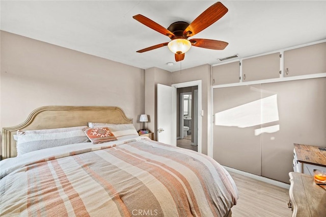 bedroom featuring ceiling fan and light hardwood / wood-style floors