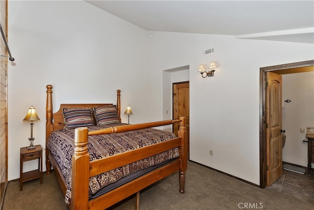 carpeted bedroom featuring vaulted ceiling