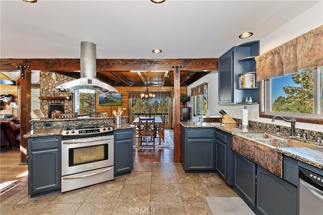 kitchen with sink, appliances with stainless steel finishes, island exhaust hood, kitchen peninsula, and beamed ceiling