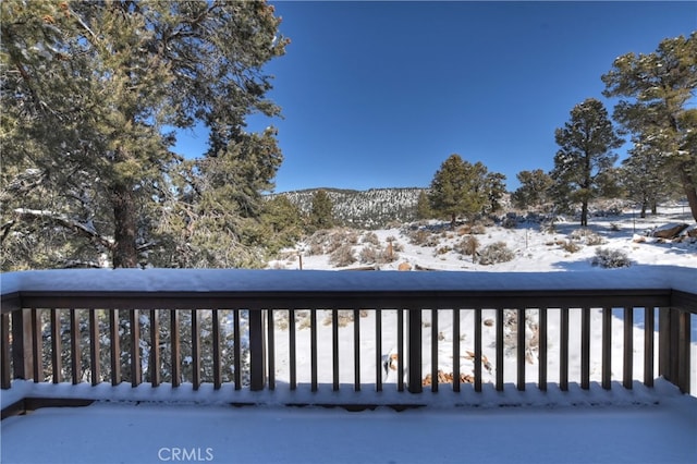 view of snow covered deck