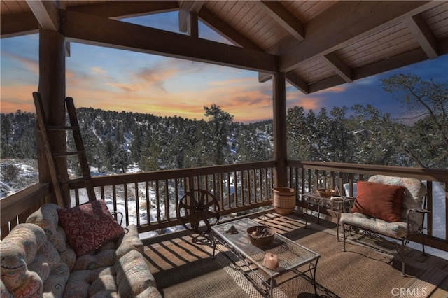 view of snow covered deck