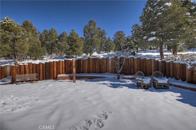 view of snowy yard