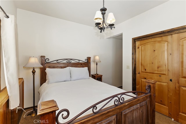 bedroom with a notable chandelier