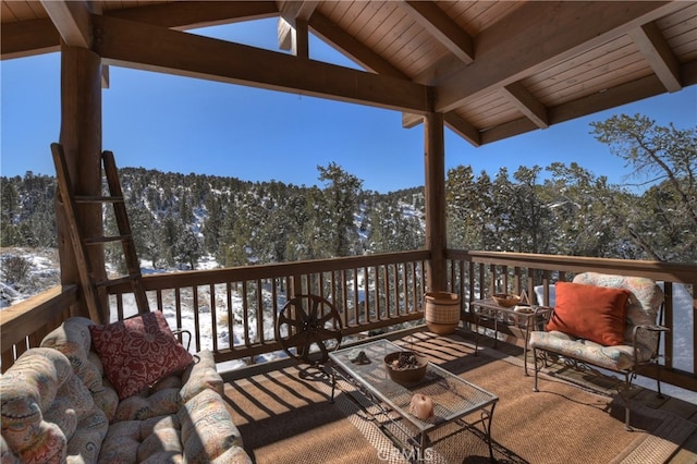 view of snow covered deck