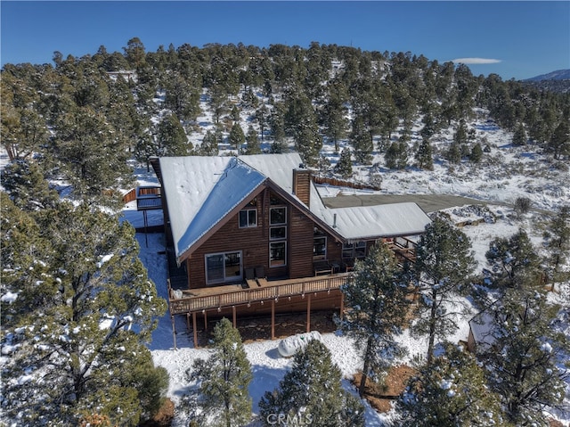 46727 Minnow, Big Bear City, CA 92314 - snow covered rear of property with a chimney, a deck, and faux log siding