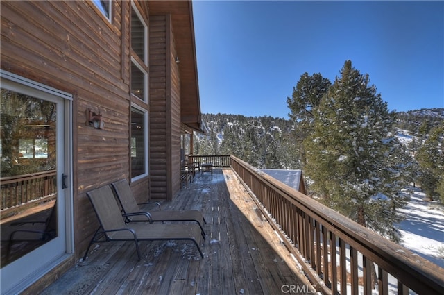 view of snow covered deck