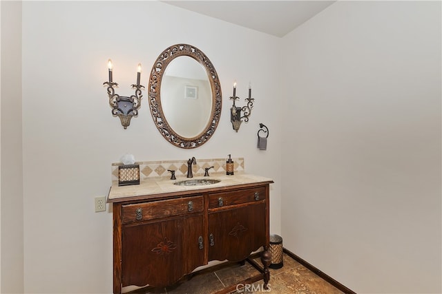 46727 Minnow, Big Bear City, CA 92314 - bathroom featuring vanity, baseboards, and backsplash
