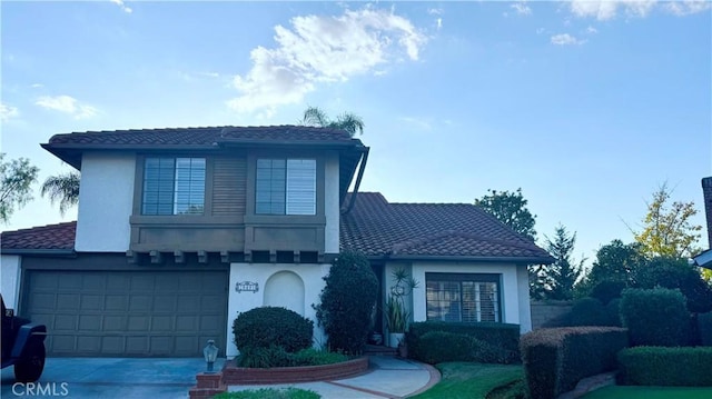 front of property with a garage